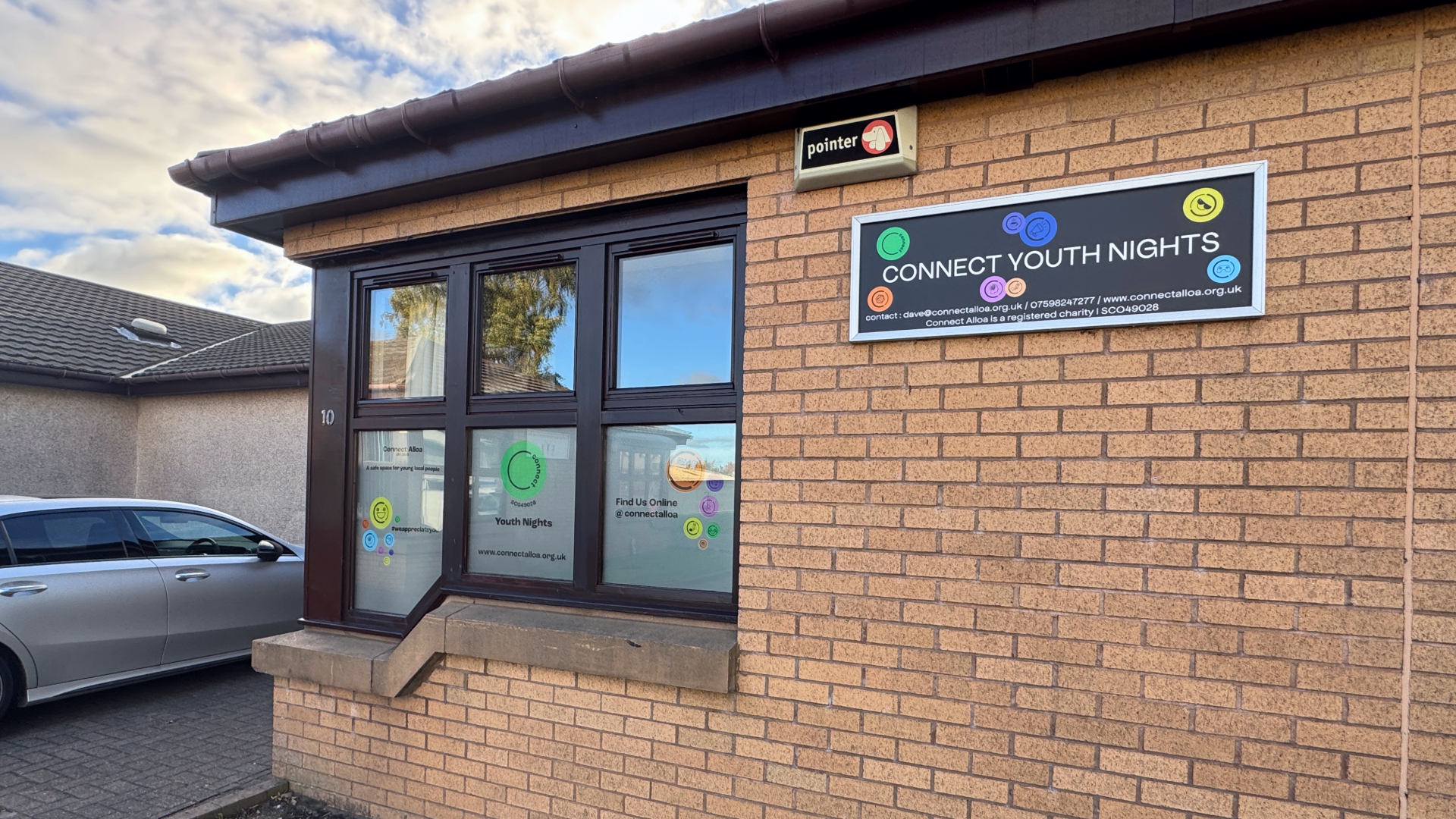 External building and window custom signage for Connect Youth Nights in Alloa