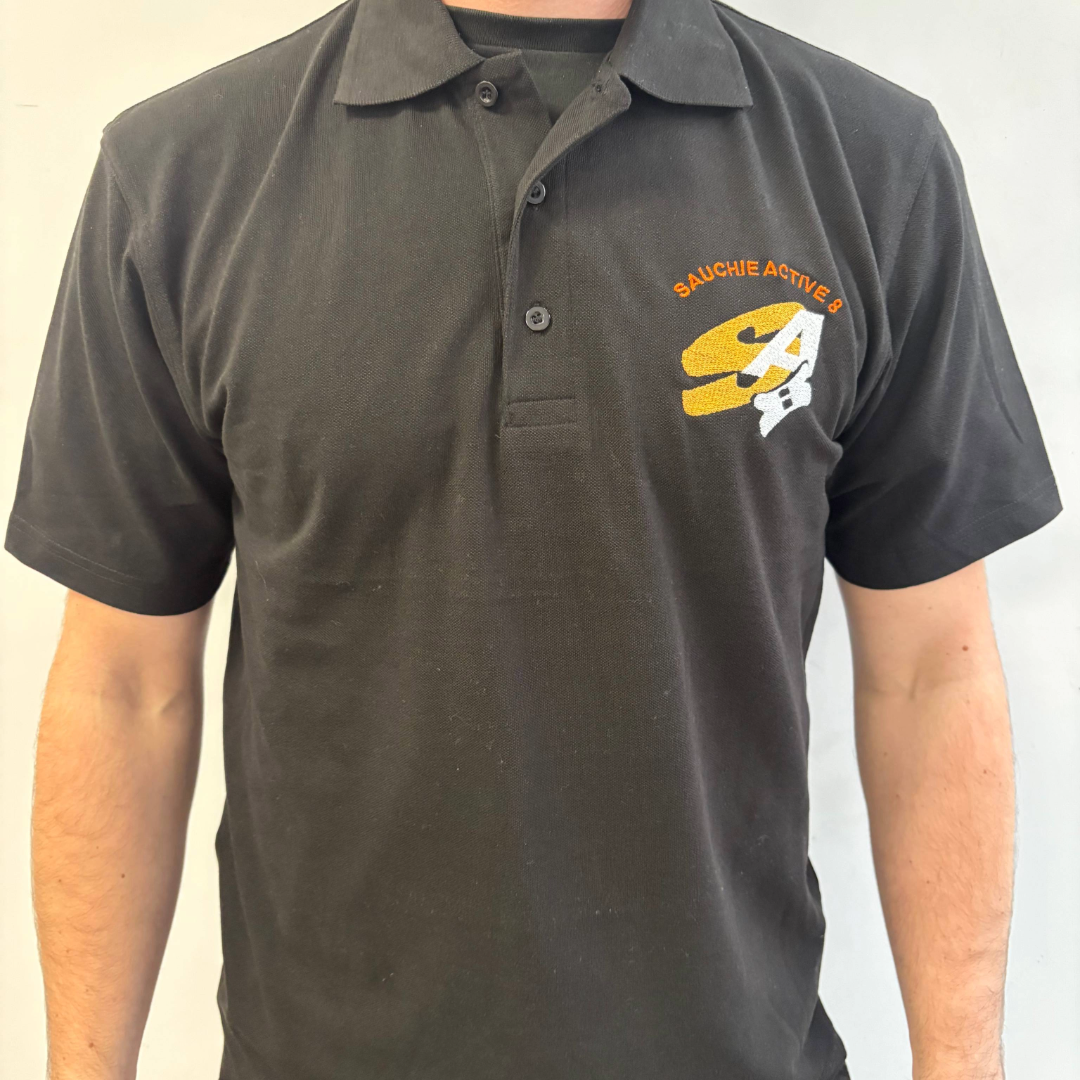Man wearing embroidered polo shirt from Advance Supplies