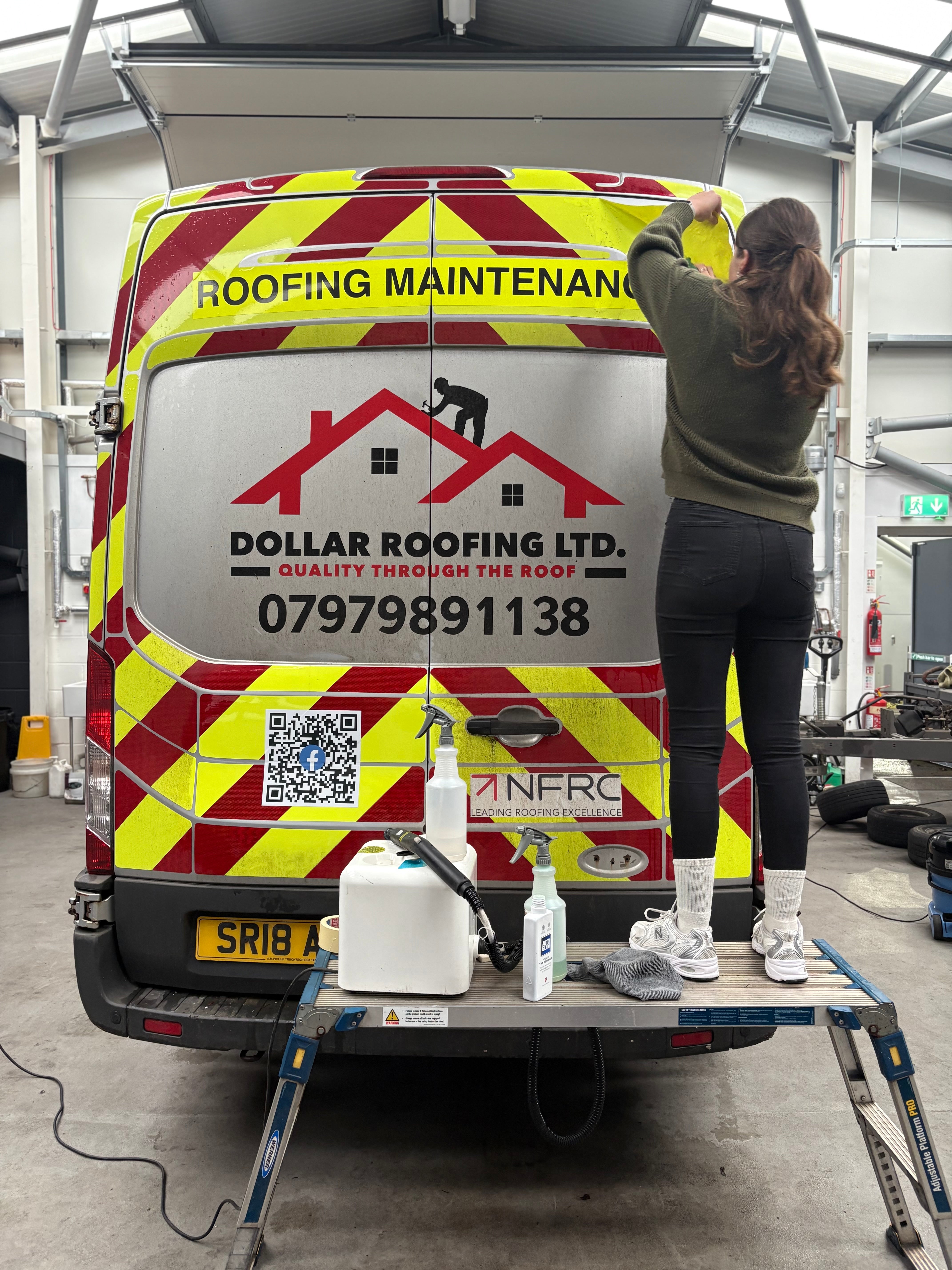 Team member installing Vehicle Chevron to van | Advance Supplies